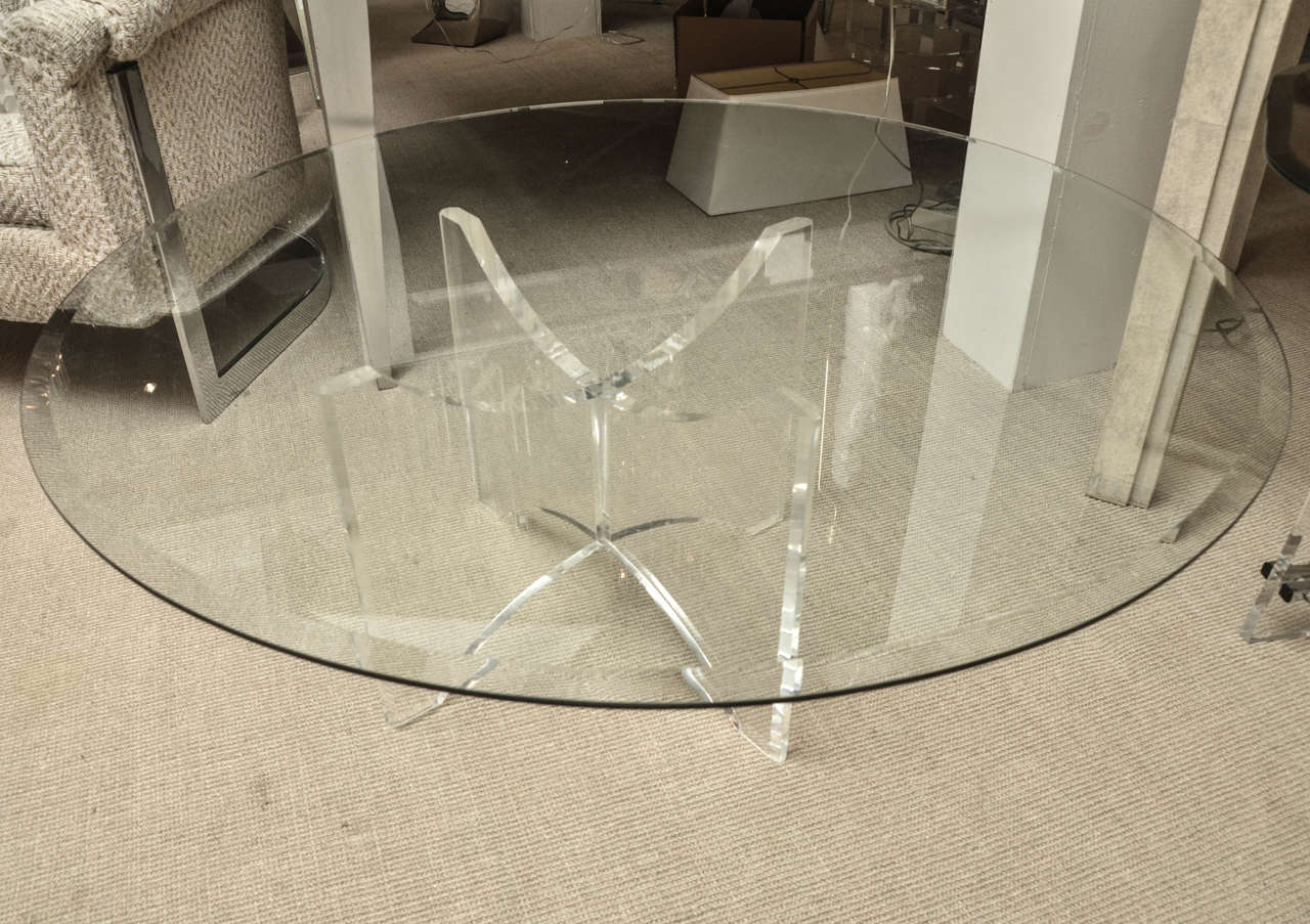 Mid-Century round Lucite cocktail table with beveled glass top.