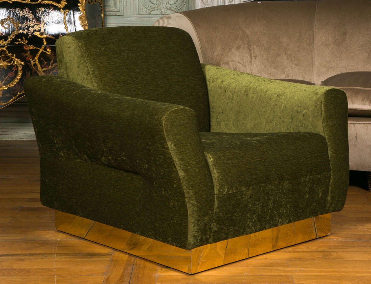 Very comfortable pair of armchairs with brass basement, newly upholstered with a khaki velvet