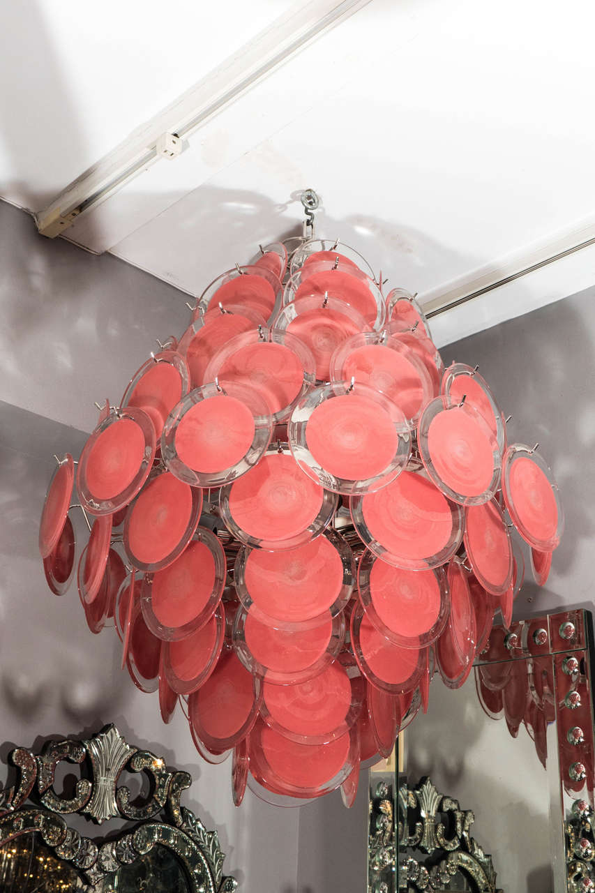 Beautiful Murano disc chandelier of coral red disc.
