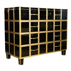 Commode all in Mirror Black and Gold with Four Drawers.