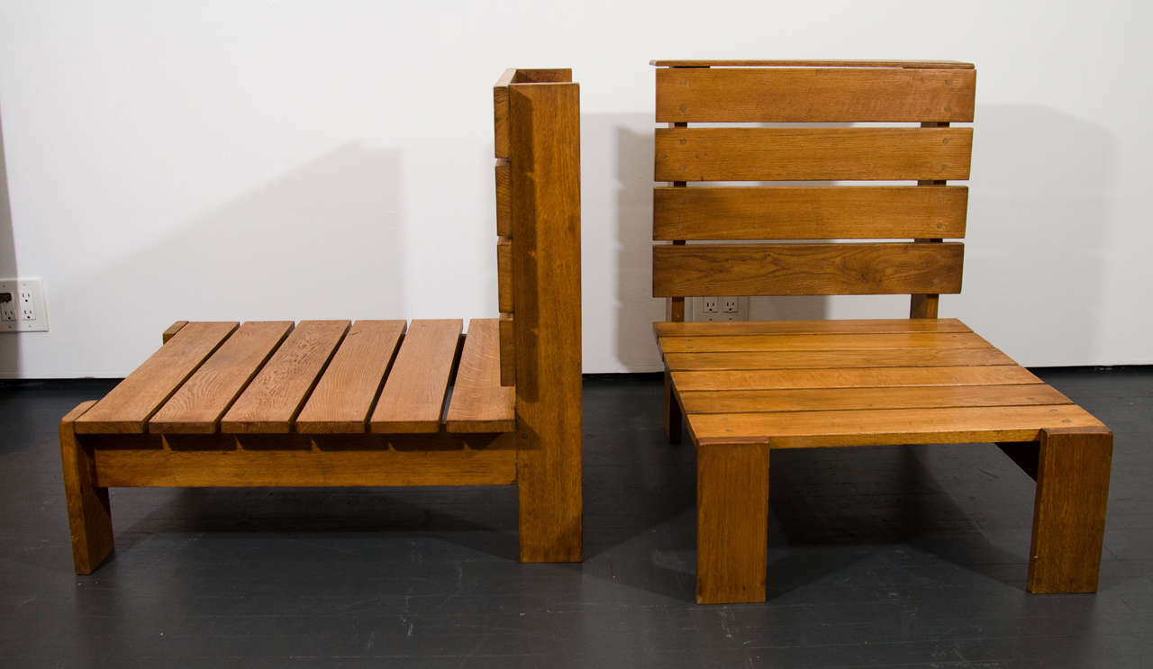 In the style of Pierre Chapo, pair of lounge chairs, circa 1950.
Wood.