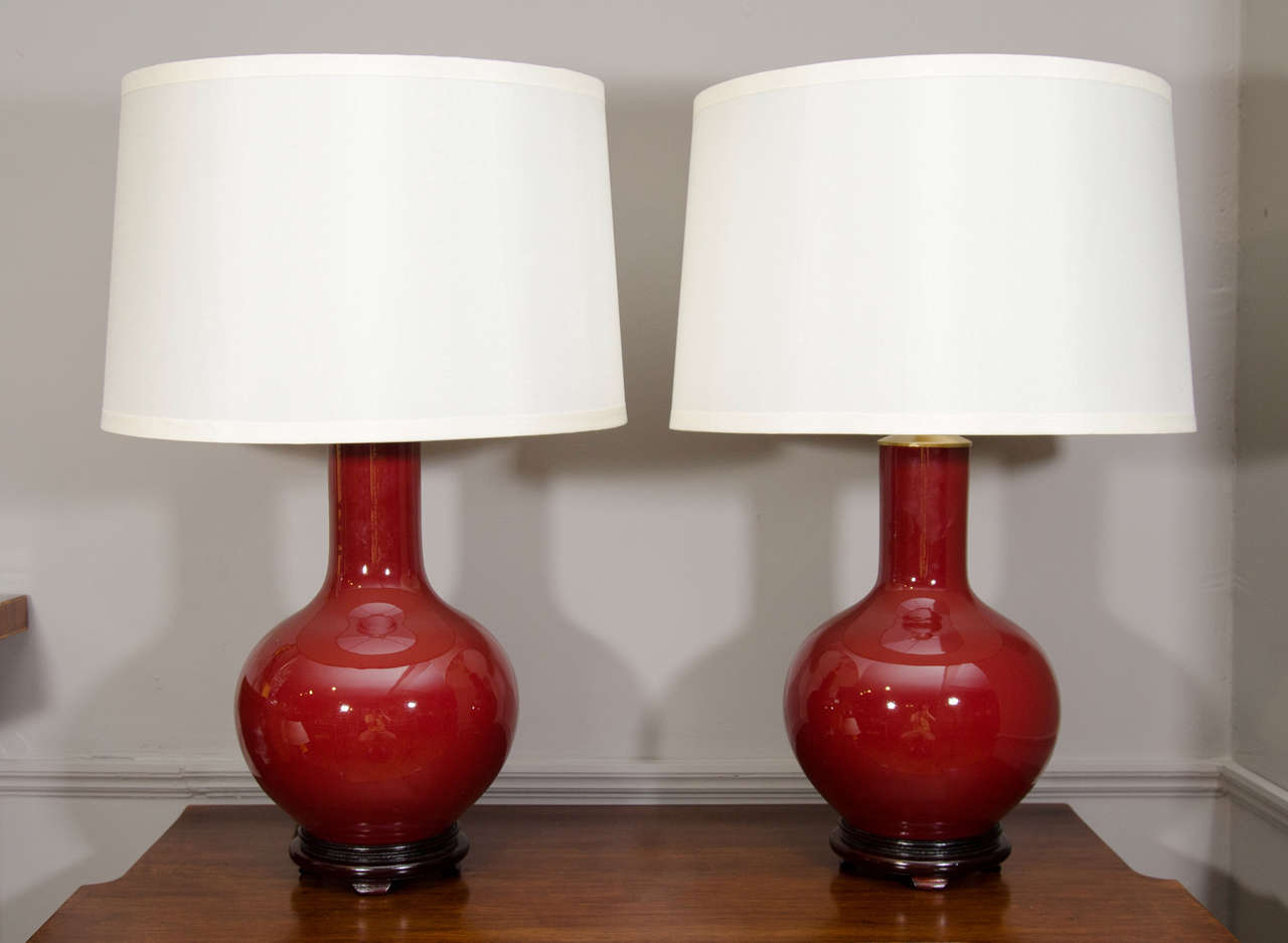 Pair of Chinese Oxblood Globular Shaped Lamps
20th Century. Shades not included.