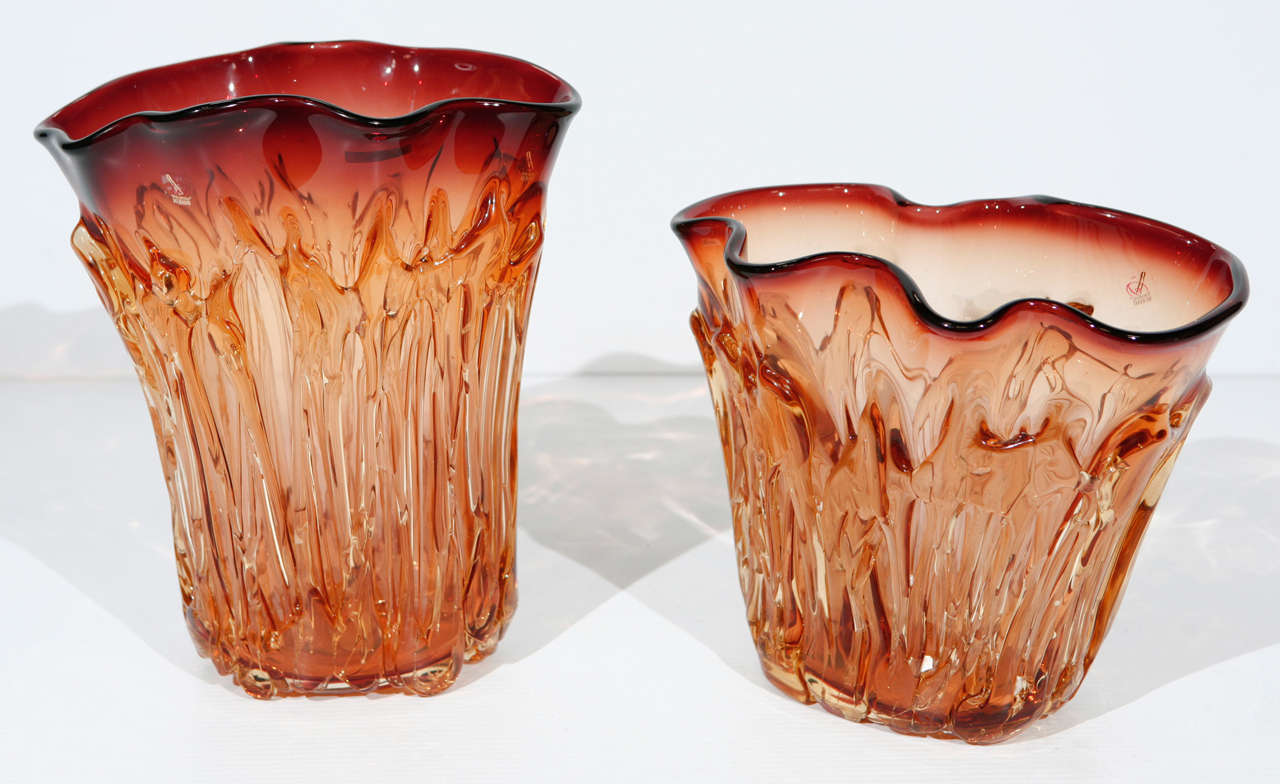 An amazing pair of large amber Murano vases, hand blown by Maestro Camozzo. 

Taller vase is 11
