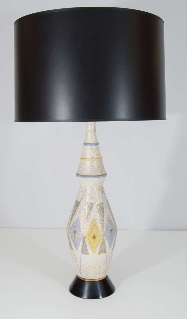 Pair of Italian lamps with a charming modernist motif; possibly Raymor. Please contact for location.