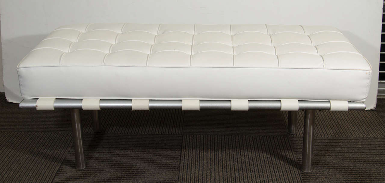 A vintage tubular chrome frame bench with button tufted vinyl upholstered seat cushion.

Good vintage condition with age appropriate wear.

Reduced from: $1200