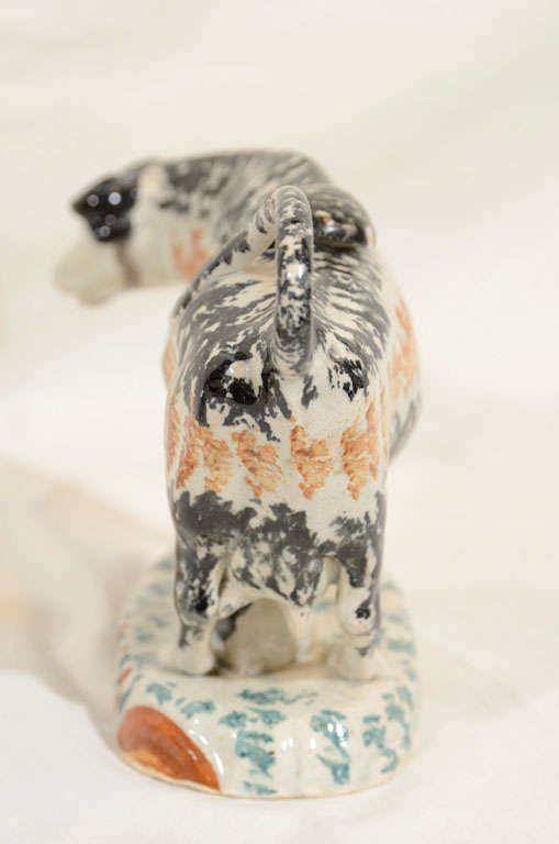 A Pair of Sponged Prattware Pottery Cows with Calves 2