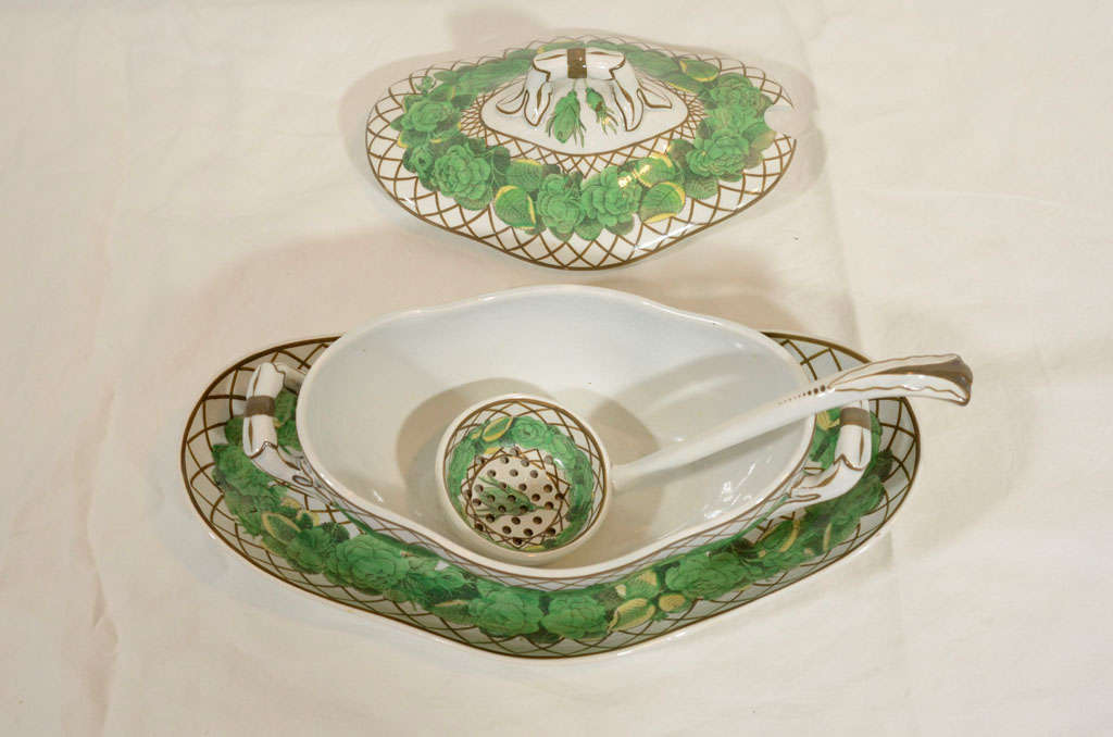 Spode's pattern #2605 with bands of green roses alternating with brown cross stitch hatching
One of the ladles is pierced (see image #8)