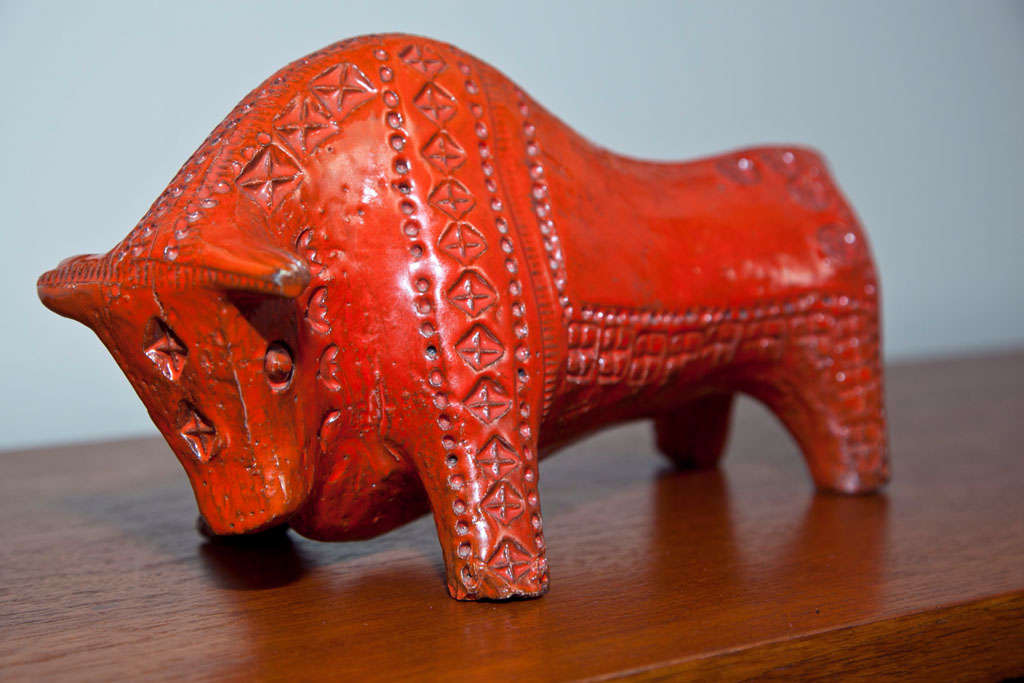 Lovely fire-red bull by Bitossi.  A great decorative piece.