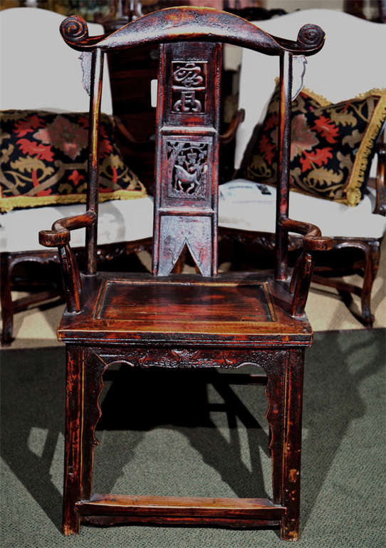 A pair of 19th century lacquered Chinese arm chairs.