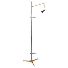 An Arrdeoluce Brass Easel Floor Lamp.