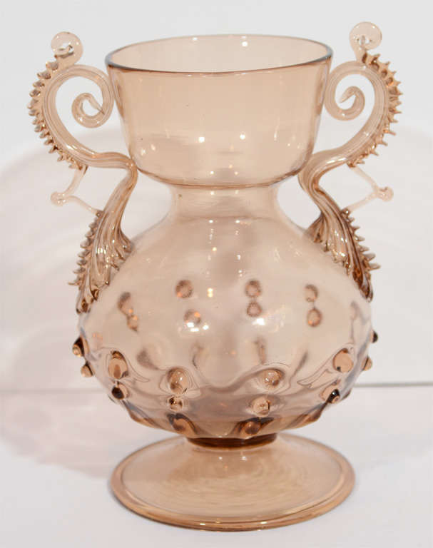 A Venetian Glass straw-color vase.