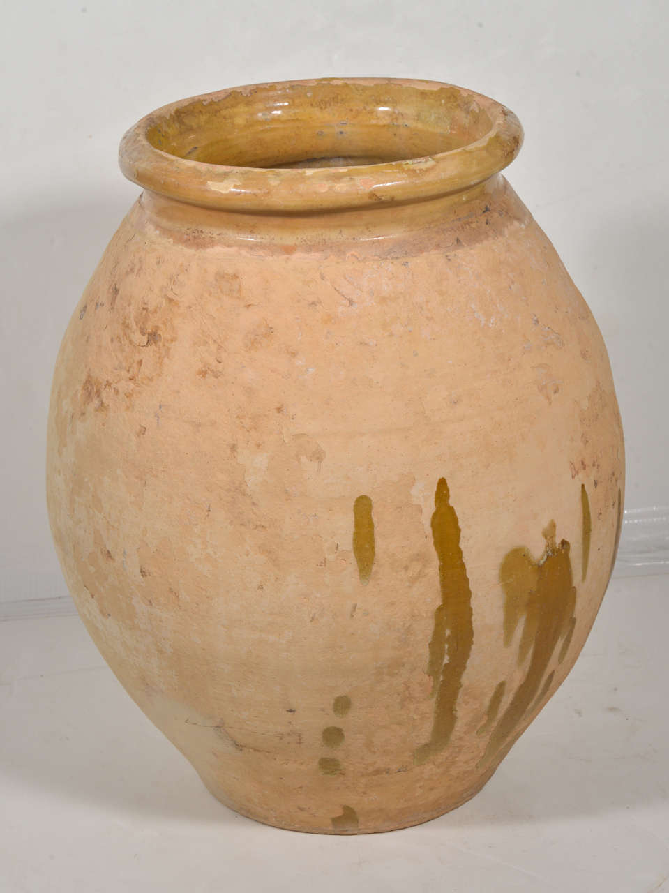 Beautiful 19th century biot jar with glaze trickling down side.