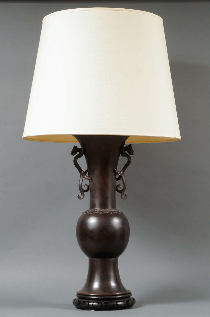 With handmade silk shade. Measure: 37 1/4 to top of shade, 36 to socket, 23 to top of lamp.

 