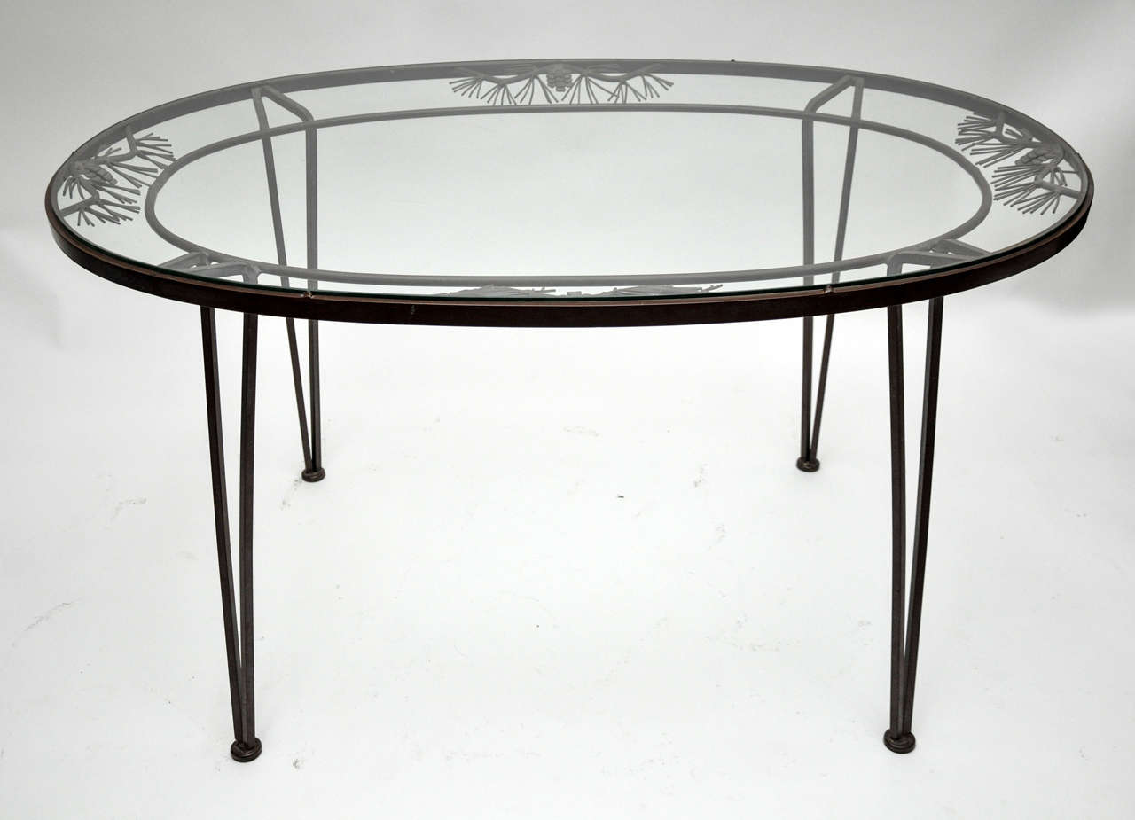 Classic Design by Woodard Furniture Co. - Mid Century oval table and 4 chairs.  The model is Pinecrest and is in taupe colored wrought iron.  Chair dimensions are:
29.5