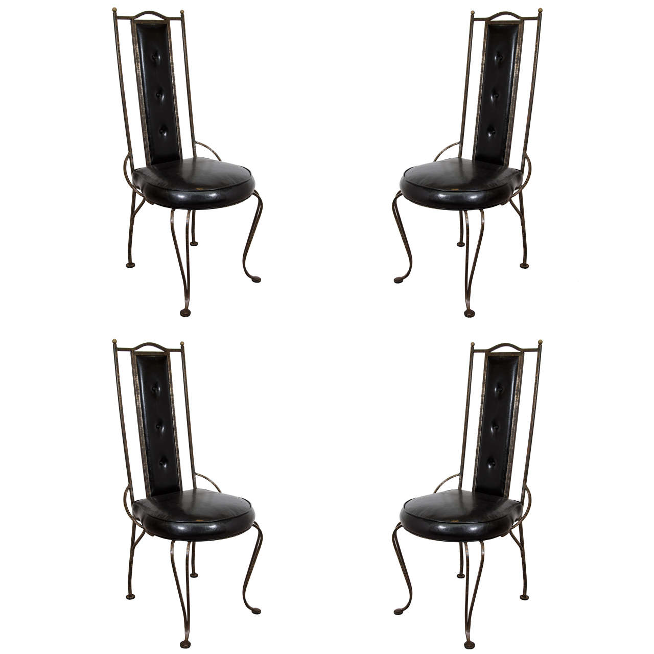 A Set of Four Mid Century Wrought Iron Dining Chairs