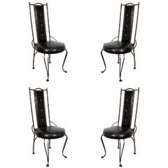 A Set of Four Mid Century Wrought Iron Dining Chairs