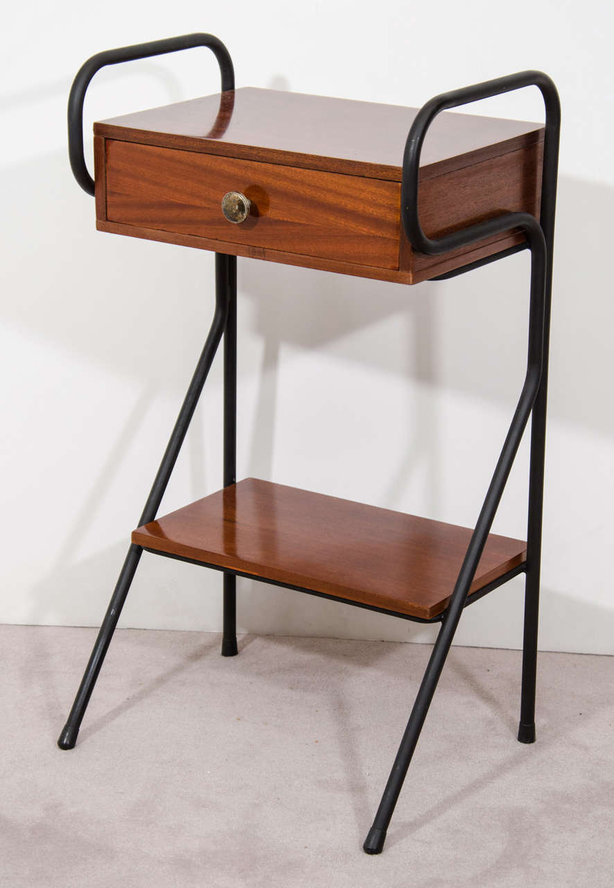 A vintage pair of Rosewood nightstands from France attributed to Jacques Hiter.
Enameled steel structure