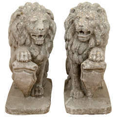 A Pair of Early 20th Century Cement and Stone Lion Sculptures