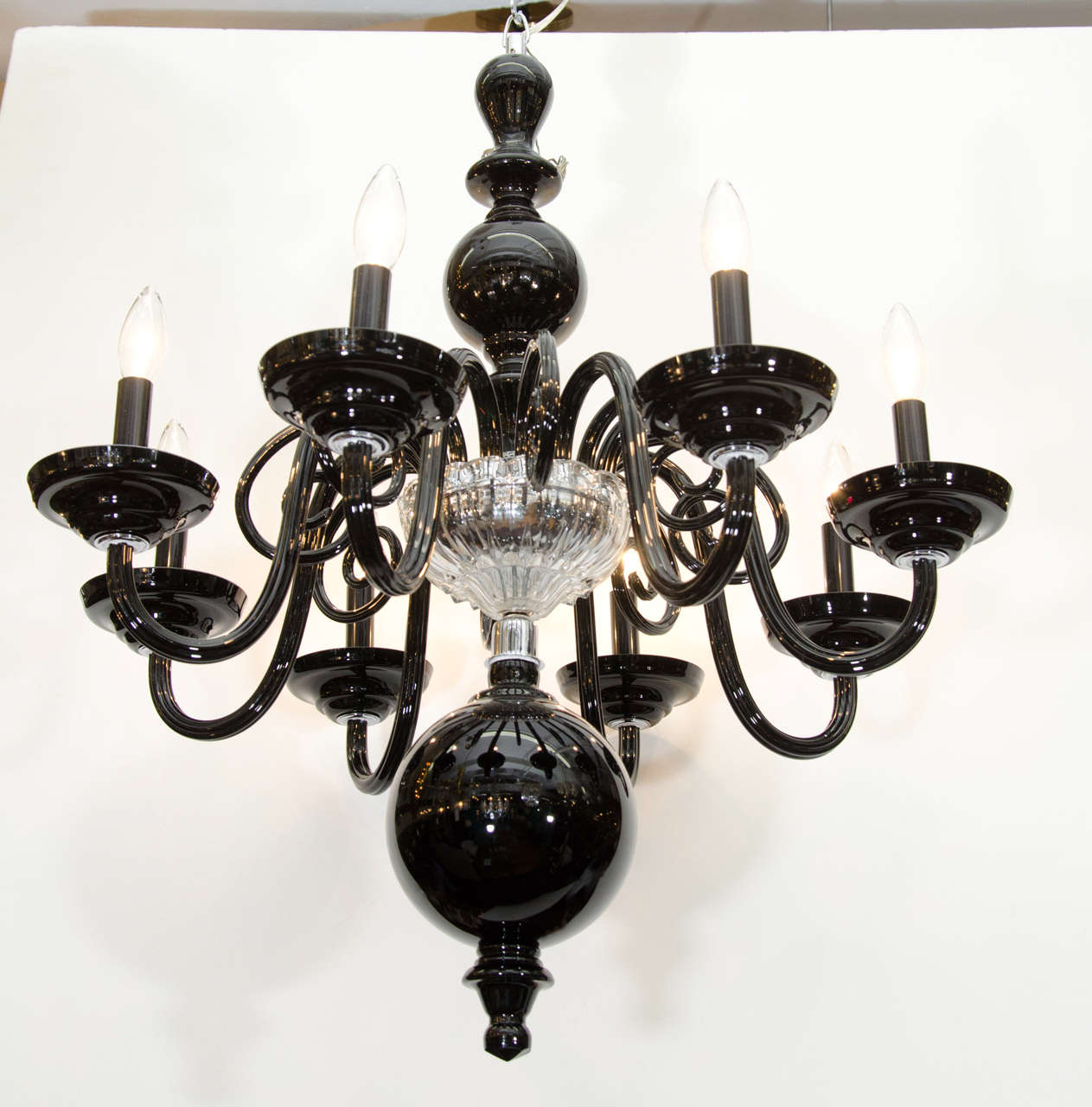 A vintage six-arm chandelier in hand blown black and clear Murano glass