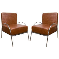 A Pair of Mid Century Chairs in Woven-pattern Vinyl