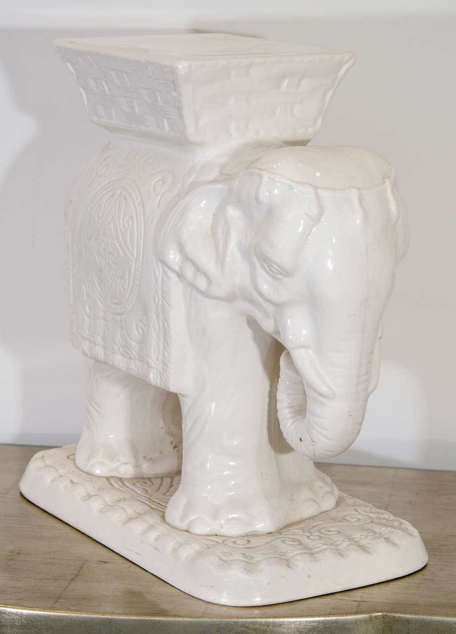 A vintage white ceramic garden stool in the shape of an elephant.
Reduced from $550