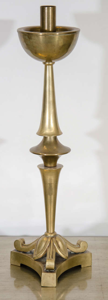 A beautiful and substantial pair of tall vintage Art Nouveau style brass candlestick holders. Measures 19