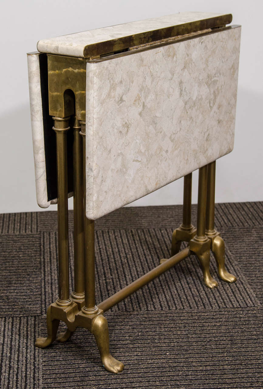 A Mid Century Folding Occasional Table by Maitland Smith