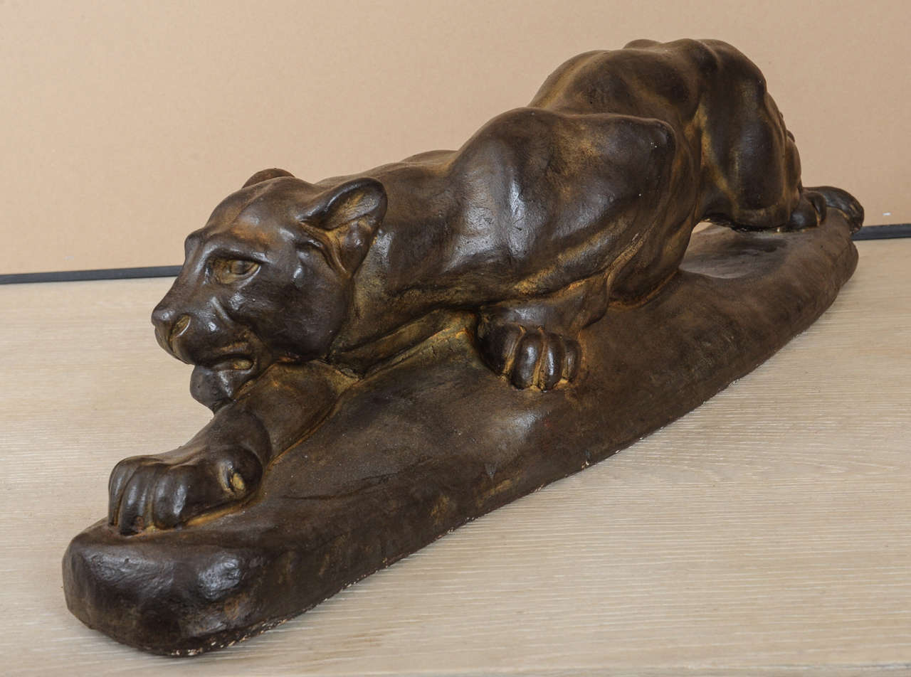 A bronze coloured  terracotta panther