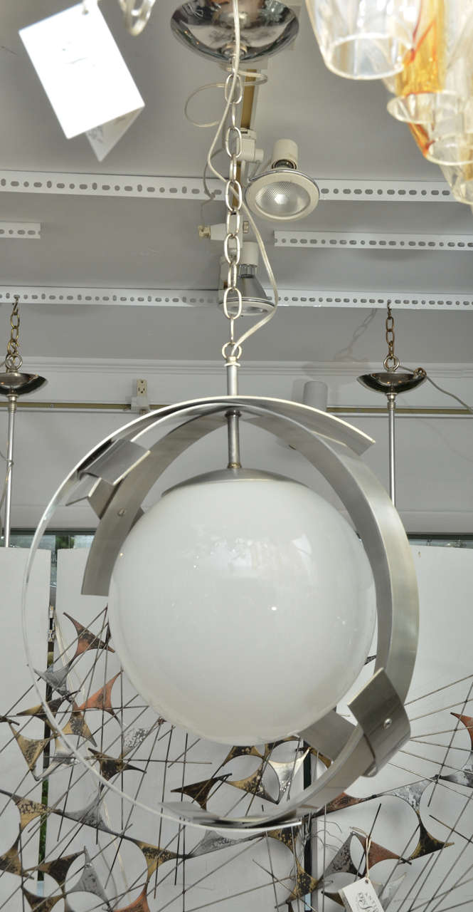 Woven Chrome Design Light Fixture Featuring White Globe