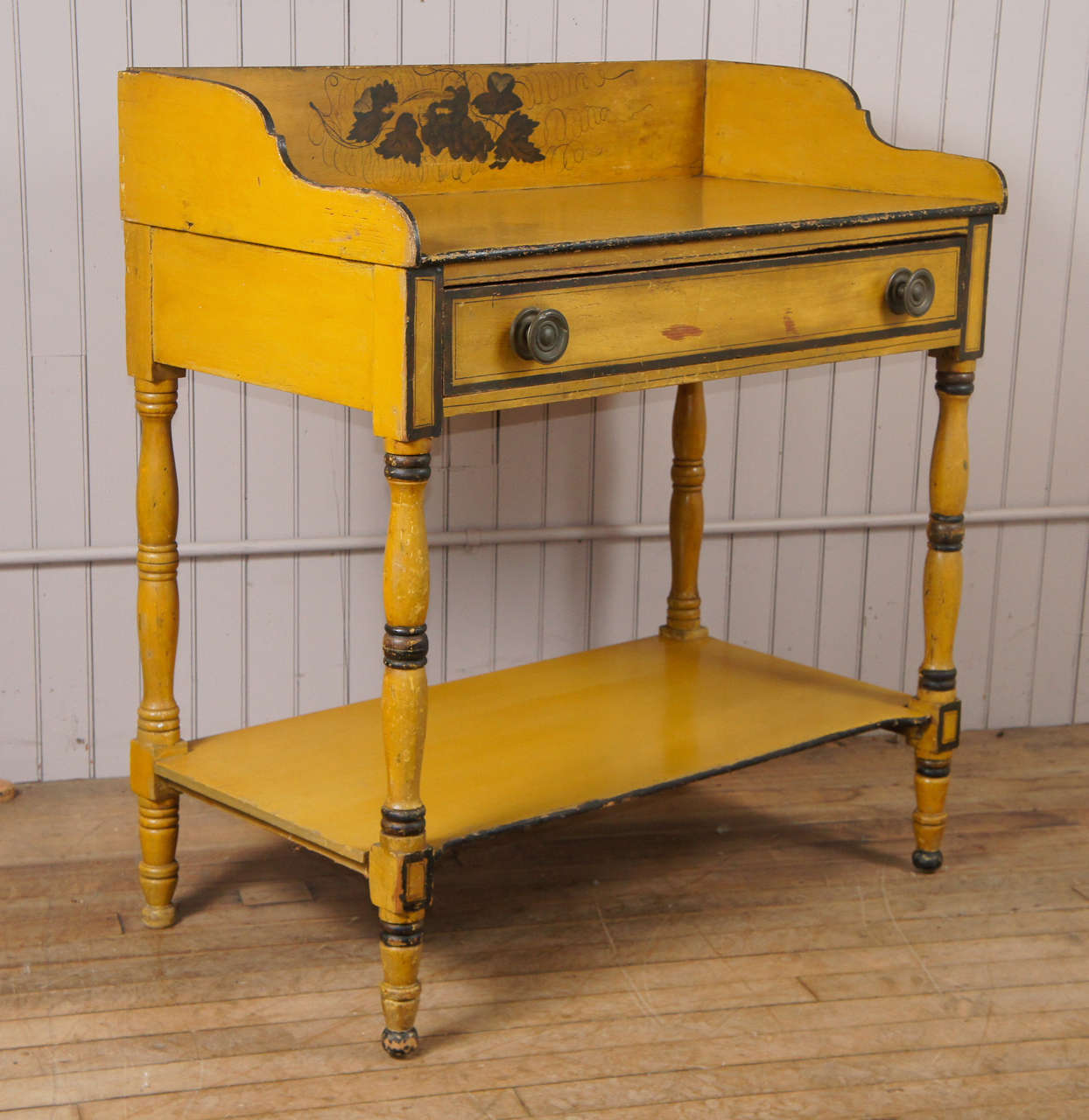 country server - in original chrome yellow painted surface - stenciled freehand bronze decoration - original Sheraton pulls