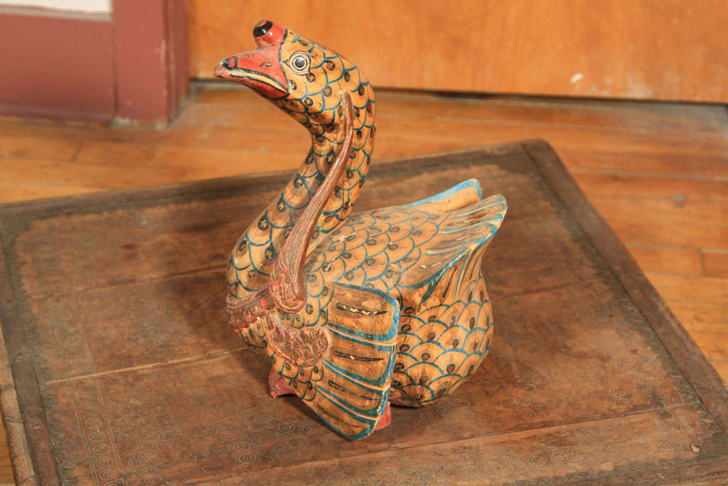 CARVED  WOOD  DUCK WITH HAND PAINTED DECORATION.  FROM CENTRAL JAVA, INDONESIA
