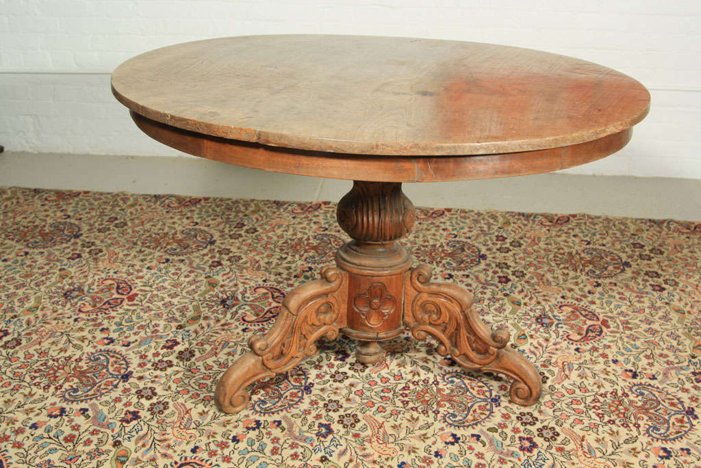 From east or central Java Indonesia.. Style shows Dutch influence. The table
is made from one piece on teak wood...All hand carved with a faded type
finish