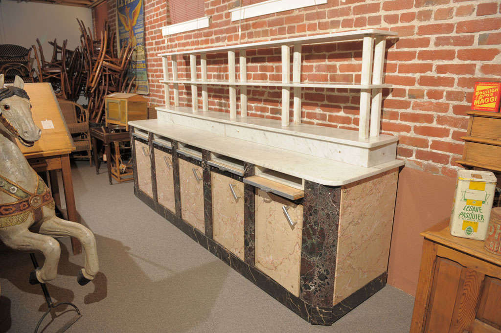 French 1930's Marble Butcher Counter with marble superstructure/shelving 
five station with storage and pull out shelves
