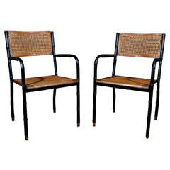 Paire of Armchairs by Jacques Adnet