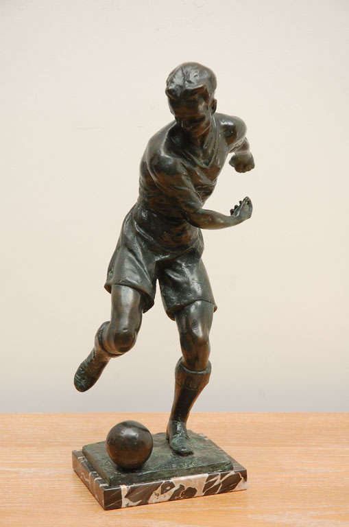Wonderful bronze sculpture of an Italian football player, c. 1920's, by noted Italian sculptor Ferdinando Vichi (1875-1945).  Marked in the bronze near the player's foot with 