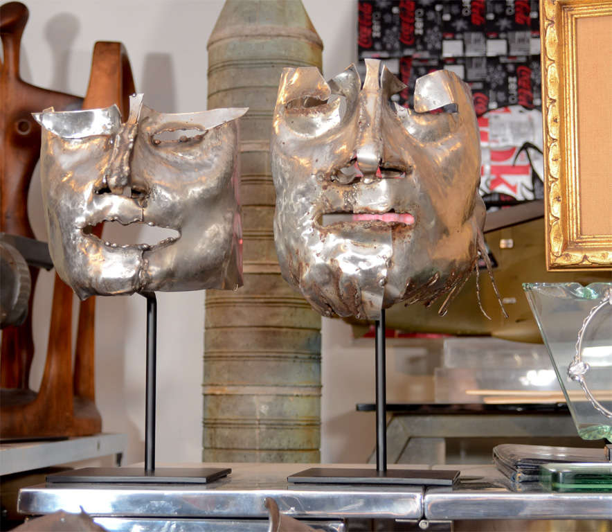 Having the appearance of masks, these pieces are casting molds for bronze sculptures. These sculpture eerily capture the visages of several of the artist's subjects.