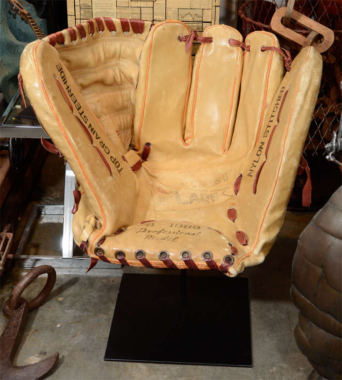 This amazing oversized replica of a Flare Baseball Glove would be an incredible gift for any baseball fan. Each of the Mantiques Modern men has a son and they have been fighting over who can take it home. While it looks like a chair, it is currently