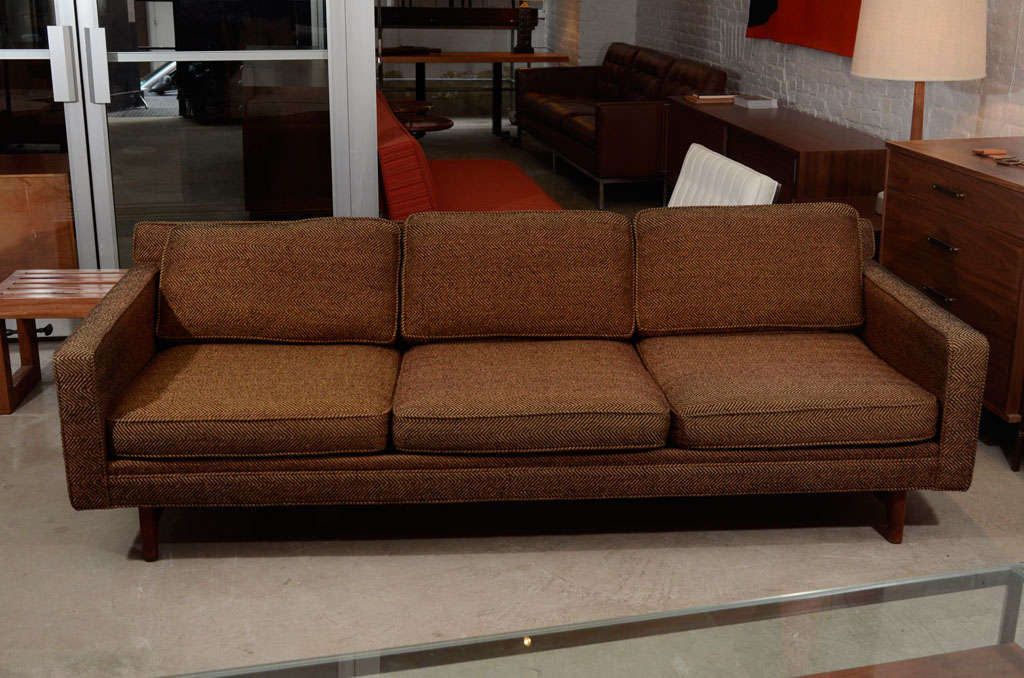 Classic vintage sofa with loose seat and back cushions