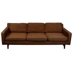 Classic vintage sofa with loose seat and back cushions