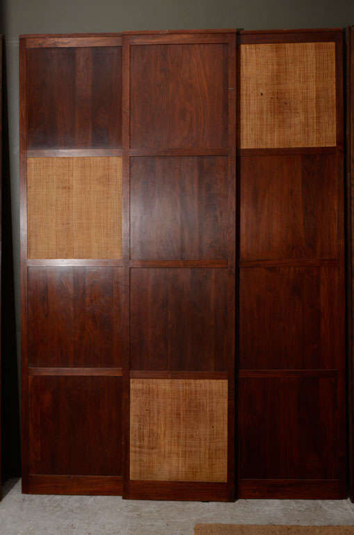 Three solid walnut panels with cane inserts. Can be made into a screen. Sold together.