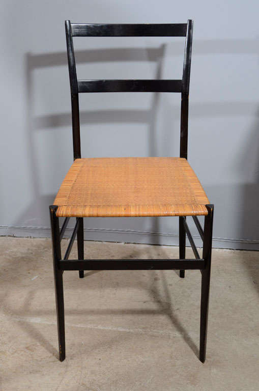 Single Gio Ponti Superleggera dining chair with original caned seat, mfg. Illums Bolighus.
