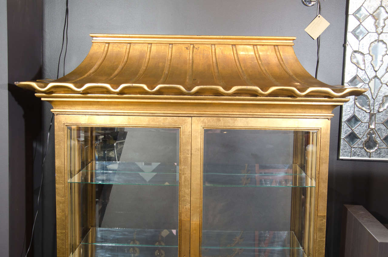 American Exceptional Illuminated Vitrine with Pagoda Design in the Manner of James Mont