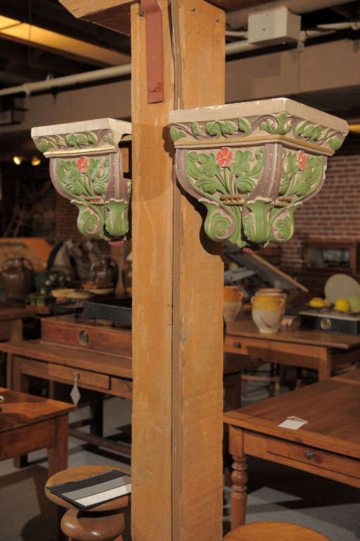 Pair of painted (on 3 sides) cast plaster Art Nouveau hanging brackets.