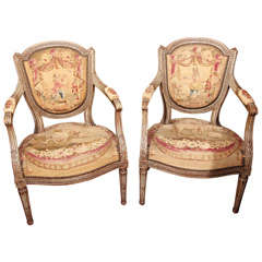 Pair Of French Gilt Armchairs With Tapestry Upholstery.