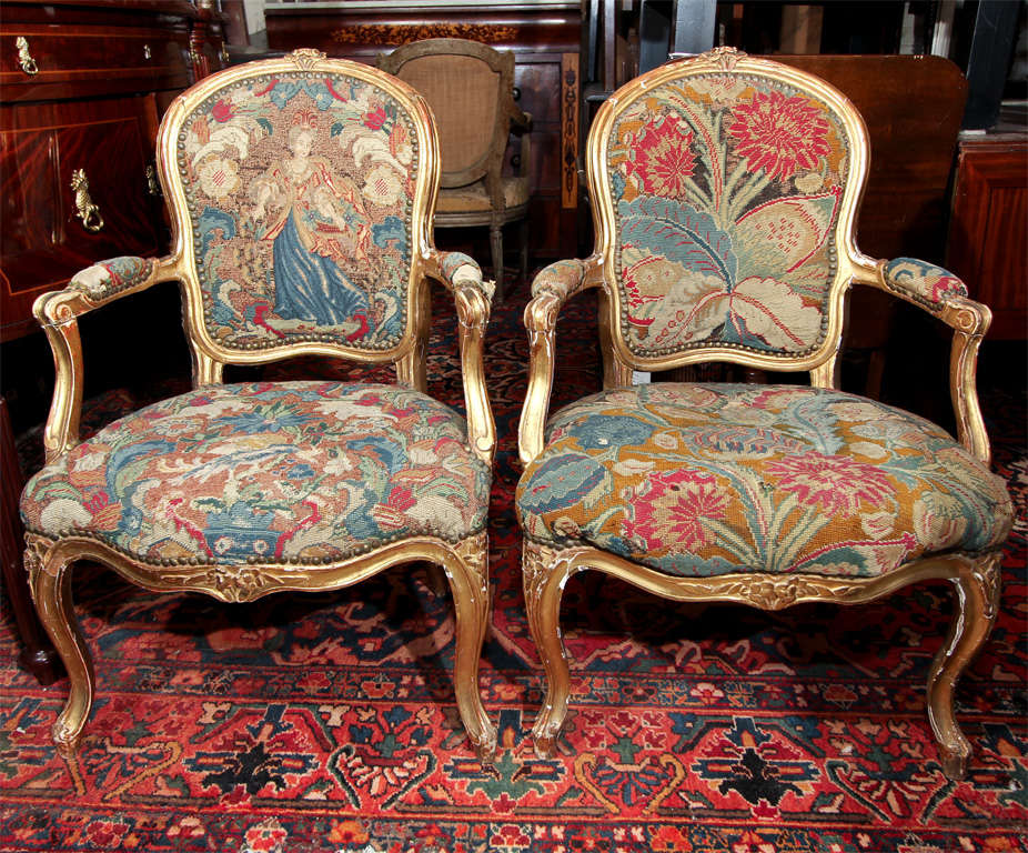 Pair of French gilt armchairs with tapestry upholstery