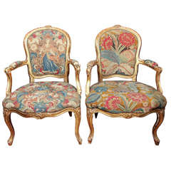 Antique Pair of French gilt armchairs with tapestry upholstery