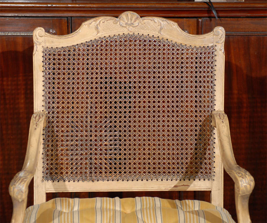 French Regence Style Painted & Caned Fauteuil For Sale