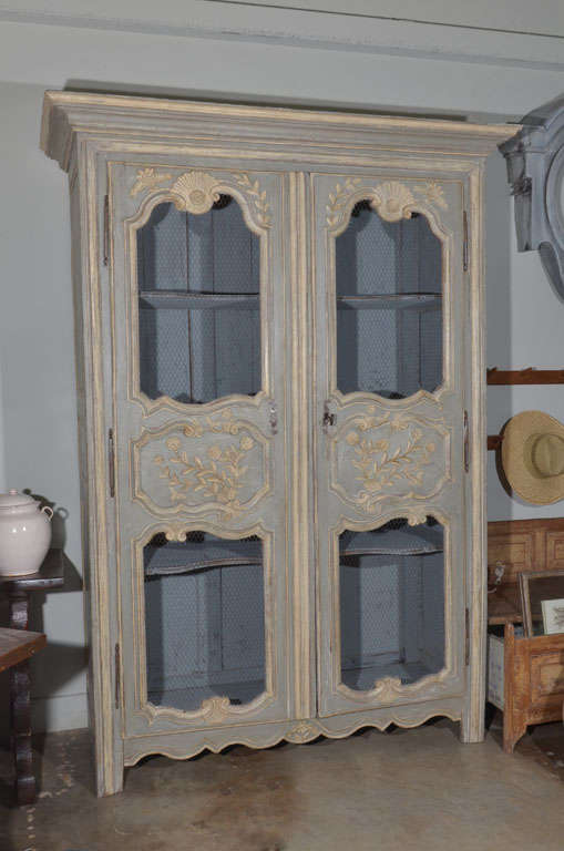 18th c. Painted Louis XV Armoire with Sculpted shelves.  Armoire is walnut  From Provence.