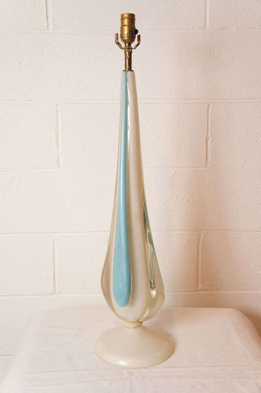 Here is a beautiful Murano glass lamp in a milky white and pale blue with gold dust.