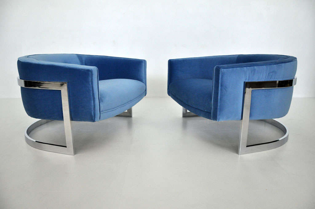 Milo Baughman designed lounge chairs for Thayer-Coggin.  Chrome frames with new blue velvet upholstery.  Extra wide seating area for added comfort.